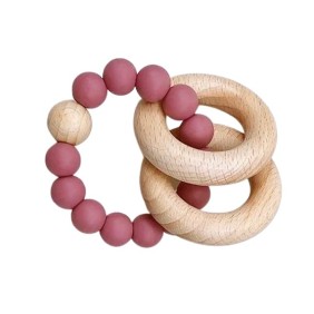Giocattolo per la dentizione del bambino, tipo braccialetto in silicone e anelli in legno, colore rosa intenso